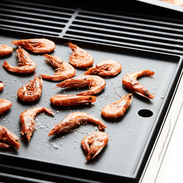 piastra-universale-2 piastra universale in ghisa smaltata, piastra universale, piastra in ghisa, piastra in ghisa per barbecue, piastra bifacciale per barbecue, accessori Barbecook, Barbecook, barbecue, barbecue Bergamo, giardinaggio, giardinaggio Bergamo, Rota Commerciale Bergamo